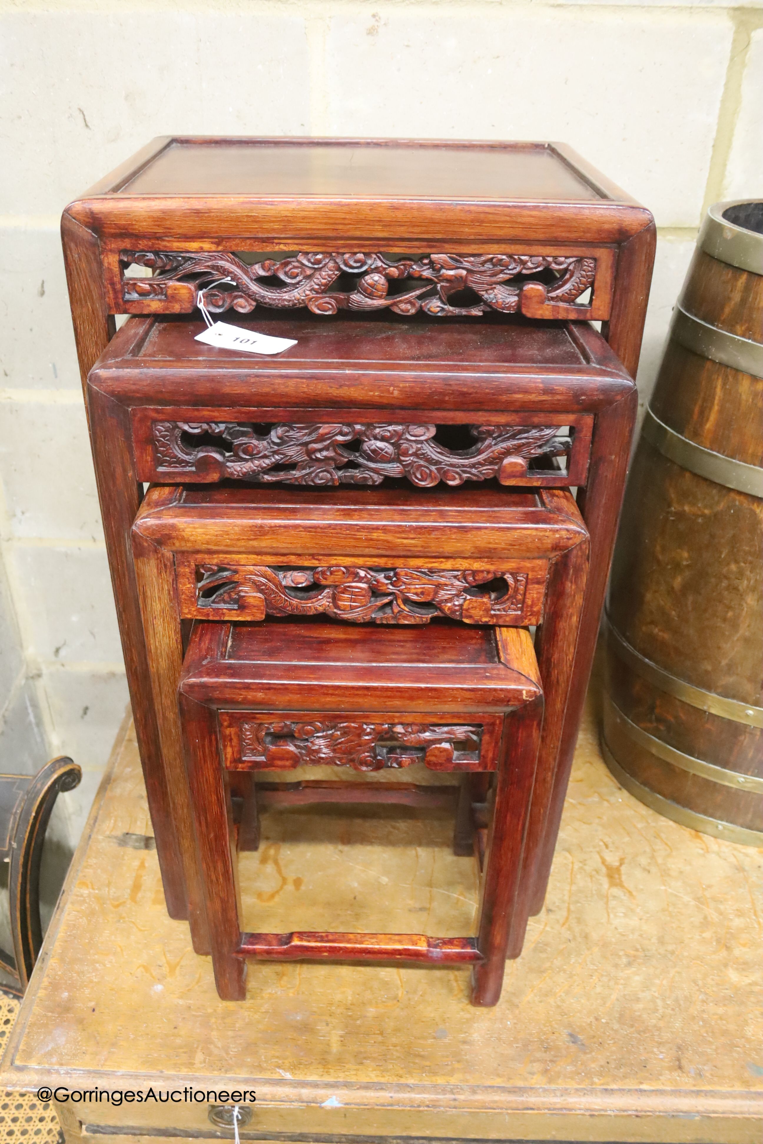 A quartetto of Chinese carved hardwood tables, width 46cm depth 35cm height 68cm